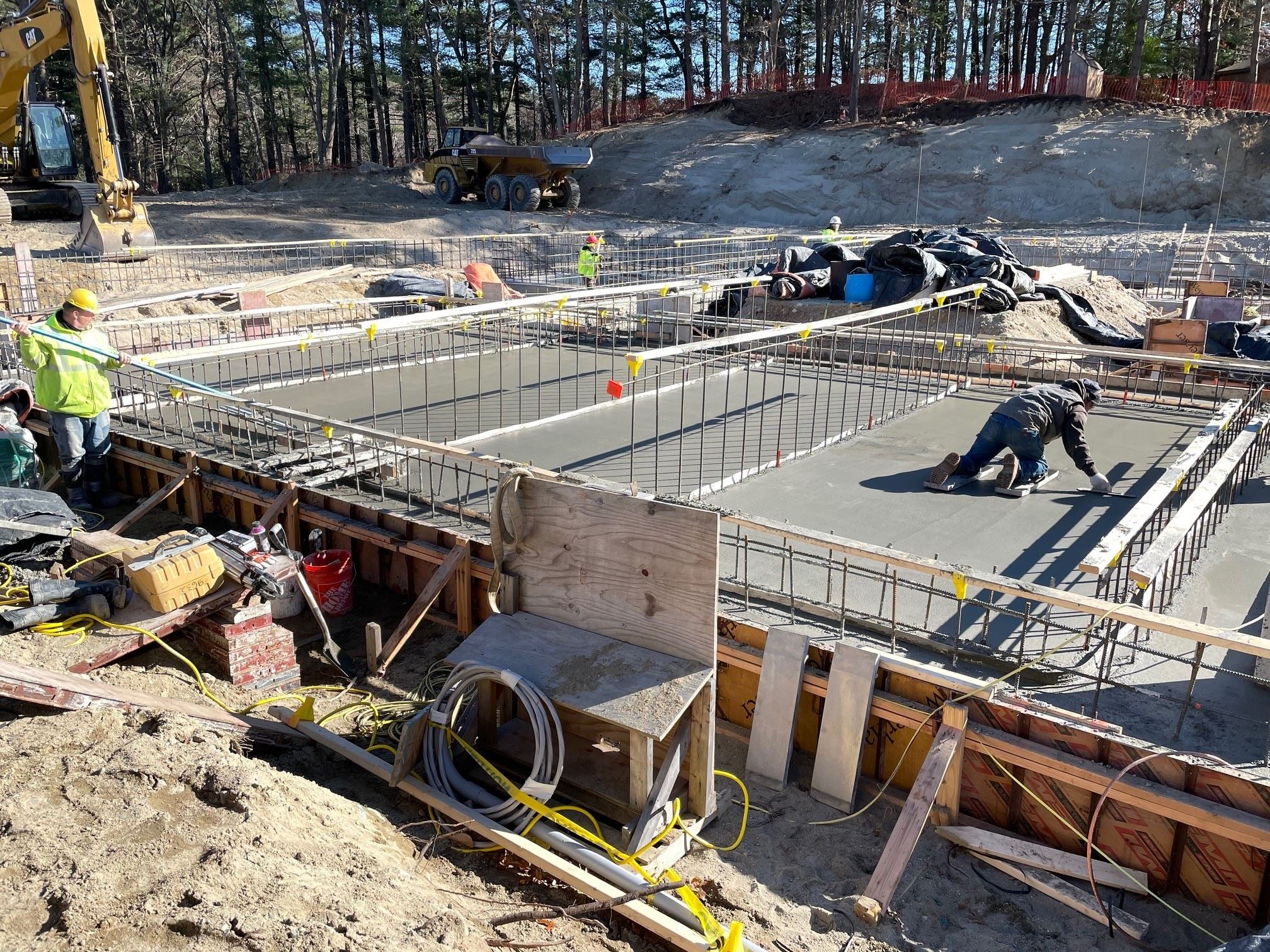 Cement Finishers on Slab on Grade at Chemical Feed Area